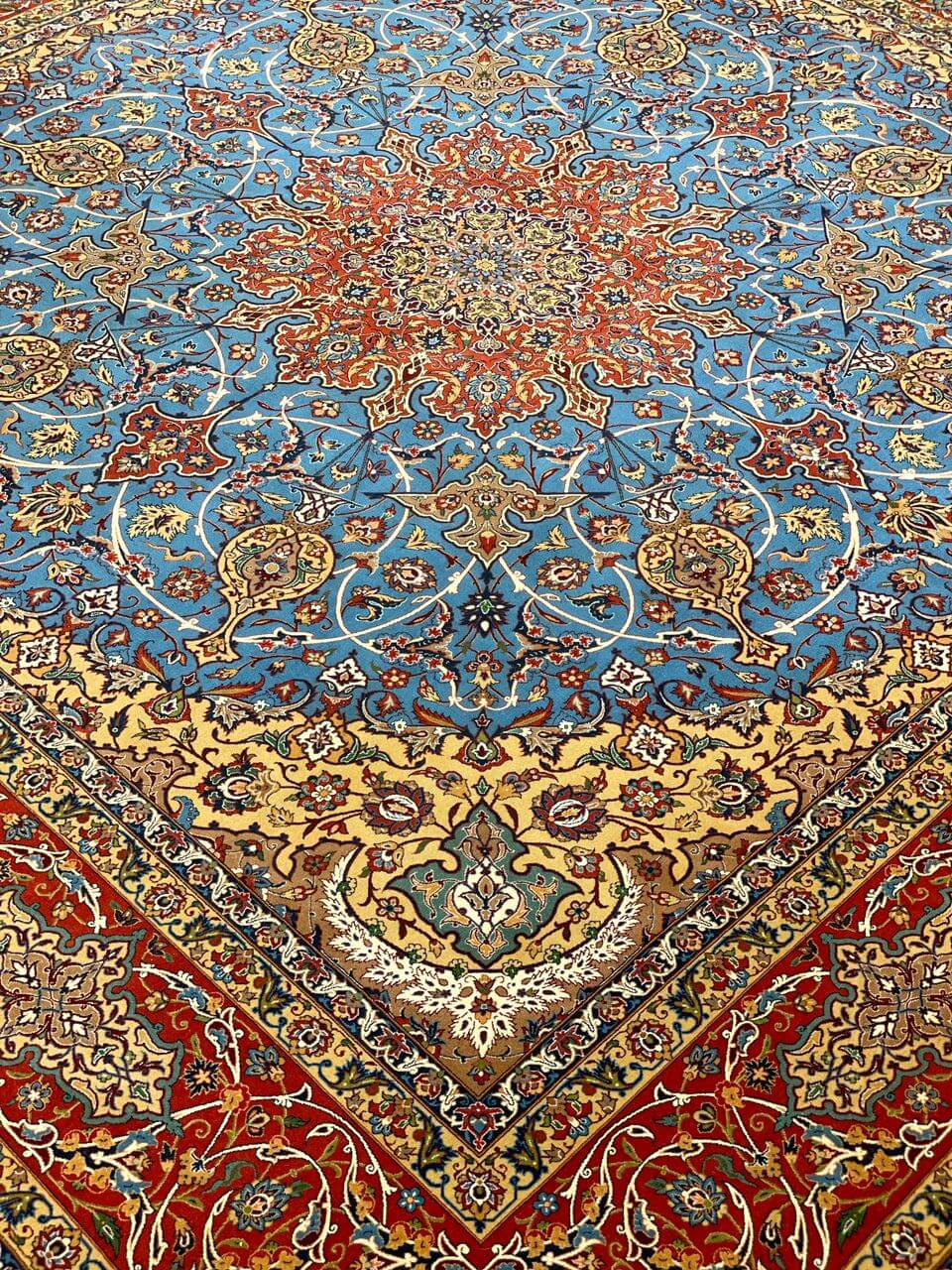 "Detailed corner view of Persian rug with traditional Isfahan motifs, 250x250 cm."